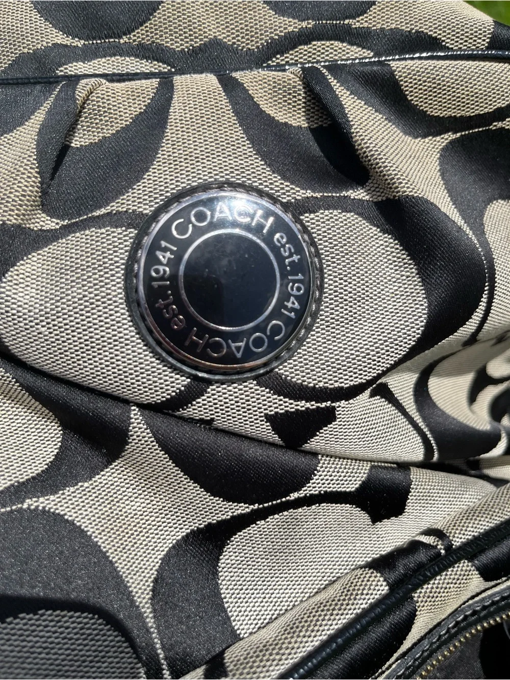 Coach signature logo